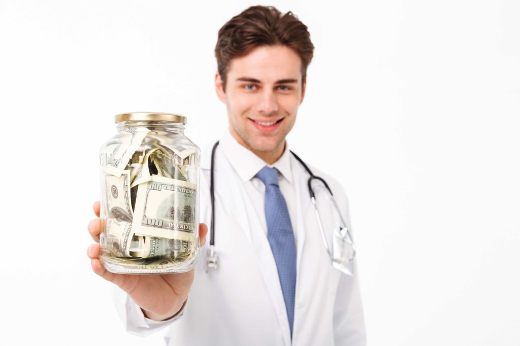 Doctor holding a jar of cash savings, representing using a health savings account (HSA) for dental expenses